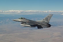 A squadron F-16 flies over the Mojave desert 181022-F-BU402-0049.jpg