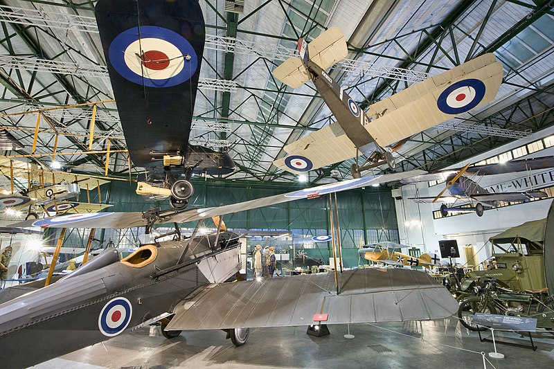 Hangar 2, Grahame-White Factory interior, Royal Aircraft Factory SE.5a in the foreground, FE.2b, Sopwith Camel and Fokker D.VII suspended from the ceiling