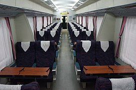 The interior of a China Railway model 25T soft seat car.