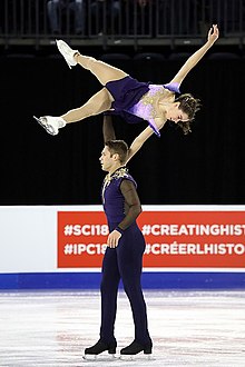 Canadians Evelyn Walsh and Trent Michaud perform a pair lift at 2018 Skate Canada. 2018 Skate Canada - Evelyn Walsh & Trennt Michaud - 17.jpg
