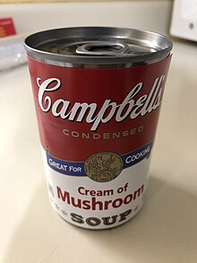 A can of soup on a kitchen counter