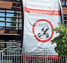Poster ad for the championships at the venue in Tirana 2022 European Weightlifting Championships AL-TR.jpg