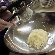 A potato ricer in use 6a - Potato Ricer (9928751634).jpg