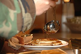 Pancakes and syrup at a pancake feed event