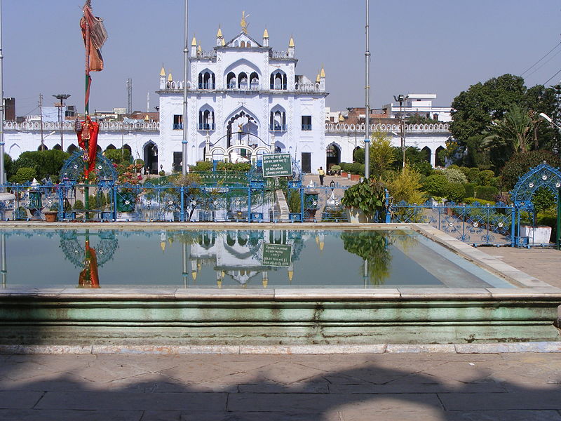 A reflection of the gateway to chhota imambara in the inner pool of water.JPG