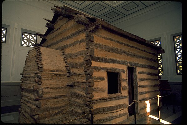 Symbolic log cabin in memorial building