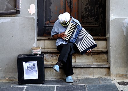 Old man playing the accordion in Old San Juan