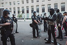 Protesters confront Federal Protective Service officers in Washington, D.C., on June 2, 2020 Black Lives Matter Protest - Washington, DC - 49975079073.jpg
