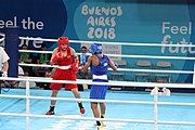 Deutsch: Boxen bei den Olympischen Jugendspielen 2018 Tag 12, 18. Oktober 2018 - Finale Leichtgewicht Mädchen – Junioren-Weltmeisterin und dreifache Juniorinnen-Europameisterin Caroline Sara DuBois (Großbritannien, blau) schlägt Juniorinnen-Asienmeisterin Porntip Buapa (Thailand, rot). English: Boxing at the 2018 Summer Youth Olympics on 18 October 2018 – Girls' lightweight Gold Medal Bout – Caroline Sara DuBois (Grat Britain, blue) wins over Porntip Buapa (Thailand, red). Español: Boxeo en los Juegos Olímpicos Juveniles de Verano de 2018 en 18 de octubre de 2018 - Combate de medalla de oro de peso ligero para niñas - Caroline Sara DuBois (Gran Bretaña, azul ) gana sobre Porntip Buapa (Tailandia, rojo).