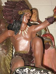 Figurine of a caboclo, the spirit of an indigenous Brazilian hunter and warrior Caboclo Pena Marrom.JPG