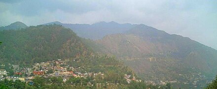 Panorama of the upper part of the town and mountains surrounding it