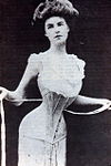 Tightening a corset applies biaxial compression to the waist. Corset 1900.jpg