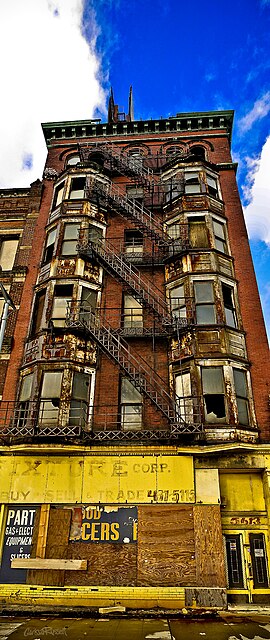 Built in 1895, the Cobb & Bradley Building in Cleveland was condemned in 2004 after years of neglect and razed by the city in 2009. Euclid Avenue panorama.jpg