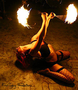 Fire Gypsy performing fire poi.jpg