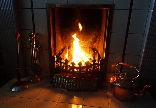 Fireplace with a coalfire in a house in Derbyshire, England