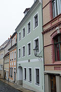 Residential house in closed development and courtyard building as an extension of Carl Jakobi's laundry and steam dyeing works from Kränzelstrasse 17 / Neißstrasse 23 and transition to this house