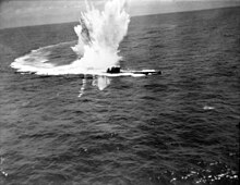 Mk. III-equipped Sunderland W4030 of No. 10 Squadron RAAF attacks U-243 in the Bay of Biscay in the summer of 1944. German submarine U-243 under attack by RAAF Sunderland aircraft in the Bay of Biscay, 8 July 1944 (C4603).jpg