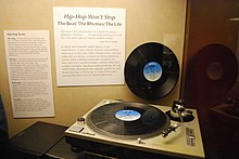 A Technics SL-1200 turntable formerly belonging to Grandmaster Flash is exhibited as a symbol for hip-hop culture in the National Museum of American History. Hip Hop turntable, National Museum of American History.jpg