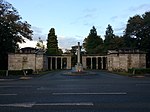 Hooton Lodge with screen wall and gates