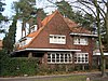 Traditionele eenvoudige bakstenen woning