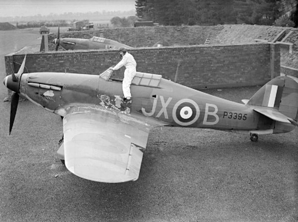 Pilot Officer "Taffy" Clowes climbing into his No. 1 Squadron Hawker Hurricane Mk.I (P3395) at RAF Wittering, in October 1940.