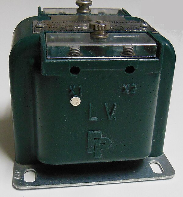 Instrument transformer, with polarity dot and X1 markings on low-voltage ("LV") side terminal