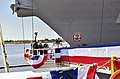 A bottle is smashed against the hull of the future Jack H. Lucas at the ship’s christening ceremony.