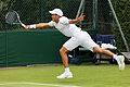 Jason Jung competing in the first round of the 2015 Wimbledon Qualifying Tournament at the Bank of England Sports Grounds in Roehampton, England. The winners of three rounds of competition qualify for the main draw of Wimbledon the following week.