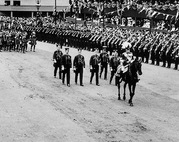 Six King's Marshalmen following the Commander-in-Chief, Field Marshal Earl Roberts, in Edward VII's Coronation Procession, 9 August 1902