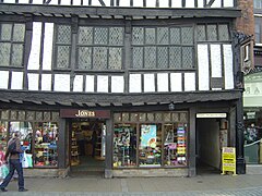 The entrance to Lady Peckett's Yard, leading through the buildings to the right of the shop