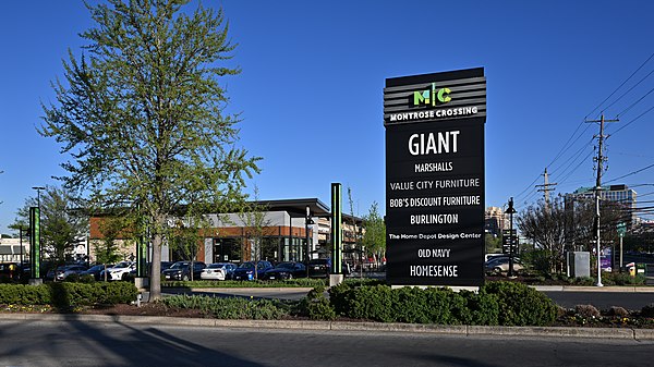 The sign and entrance for Montrose Crossing shopping center in Rockville, MD