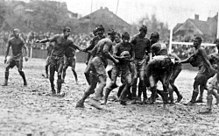 From 1906 to 1914, the Big Game (American football) was played under the rules of rugby union. The picture shows the 1912 edition of the series Mud game 1912.jpg