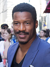 Nat Turner is played by Nate Parker, who also wrote, produced, and directed the film. Nate Parker 2014.jpg
