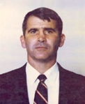 Oliver North zdjęcie mugshot.png