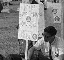 "One Man One Vote" protest at the Democratic National Convention in Atlantic City, New Jersey, 1964, before passage of the Voting Rights Act and when delegates of the Mississippi Freedom Democratic Party attempted to be seated. One Man One Vote 1964 DNC protest (1).jpg