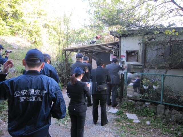 PSIA officers conduct a surprise inspection on a suspected Aleph building in 2013.