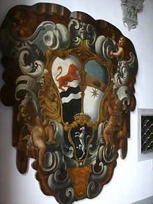 The combined family crest: Del Turco (prancing lion) Palazzo borgherini rosselli del turco, stemma.JPG