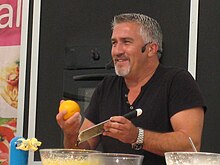 Paul Hollywood zesting a lemon at the Stratford Food Festival Paul Hollywood zesting.jpg