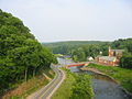 Joppenbergh Mountain (left), Route 213 (center) and the Rondout Creek (right), viewed from the Rosendale trestle overlooking the town