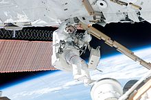 Astronaut Steven Swanson participates in EVA 2 STS-117 Swanson EVA.jpg