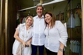 Secretary Kerry Poses for a Photo With a Store Owner (29949979495).jpg