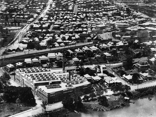 Aerial view of Petrie Terrace, ca. 1925. Morrows biscuit factory (later to become Arnott Morrows) on River Road (renamed Coronation Drive in 1937), Mi