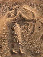 Priest-King with bow and arrows, Susa II, Louvre.[38]