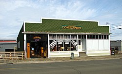 Photograph of a one-story storefront