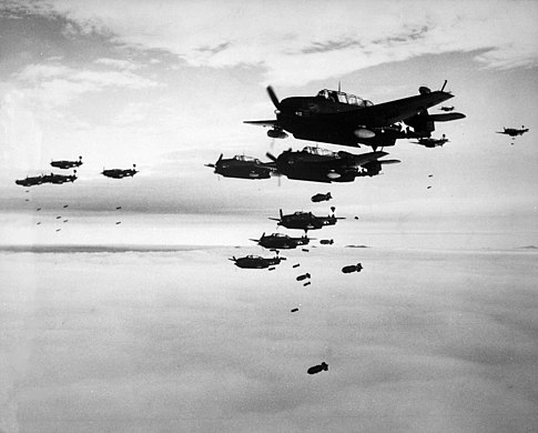 US Navy Grumman TBF Avenger aircraft dropping bombs on Hakodate during July 1945