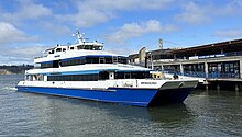 Golden Gate Ferries connect the city to North Bay communities, while San Francisco Bay Ferry connects the city to both the North and East Bay. The Larkspur Ferry "Mendocino" at the San Francisco Ferry Terminal in June of 2023 (cropped).jpg