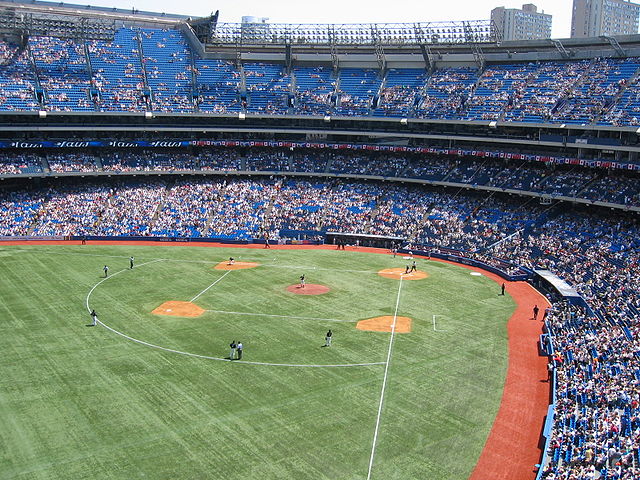 Interior view of a stadium, taken from the upper deck and looking down the 3rd base line