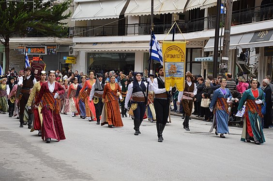 People wearing traditional Pontic (or Pontian) costumes during a parade for a major national celebration in Greece.
