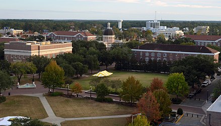 Aerial view of Bennett Auditorium (left), Lucas Administration Building (rear, dome), and Forrest County Hall (right) from the Johnson Science Tower