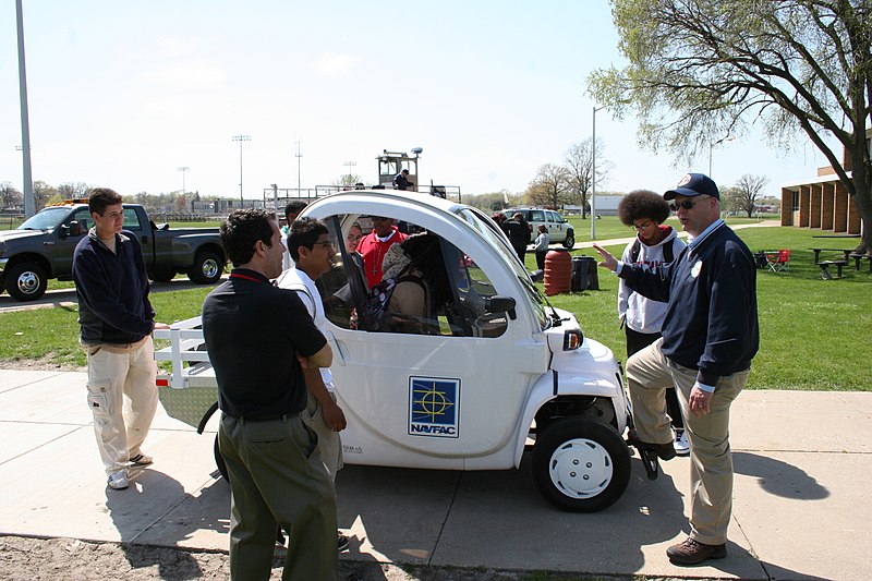 File:US Navy 100429-N-9876C-010 Mark Schultz, environmental director for Naval Facilities Engineering Command (NAVFAC) Midwest, explains to students at North Chicago Community High School about electric vehicles.jpg